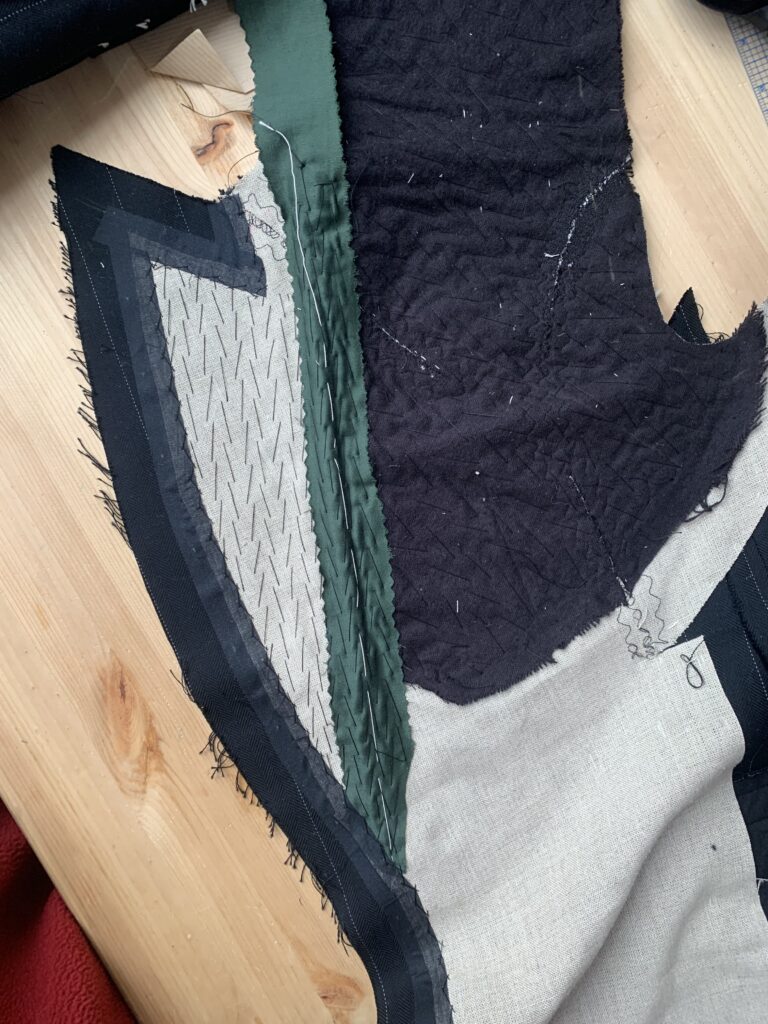 Canvas cut back, taped and herringboned down