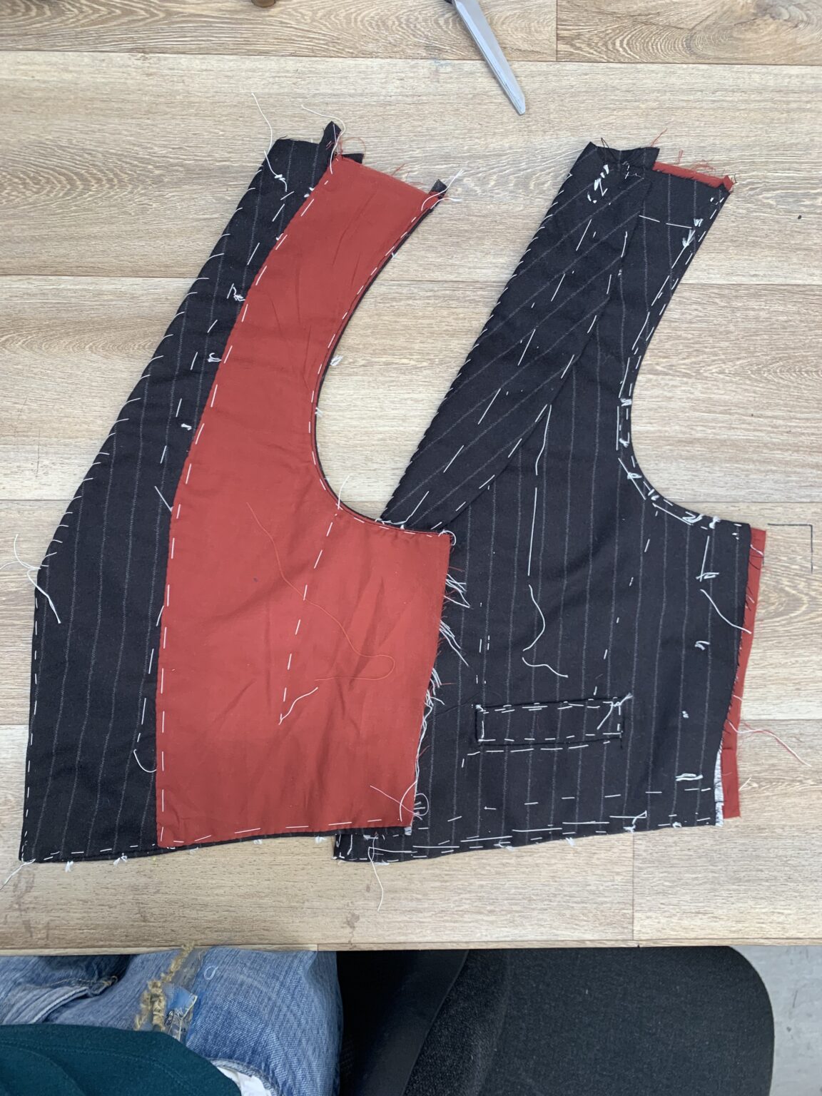 Shows facing and lining tacked into place