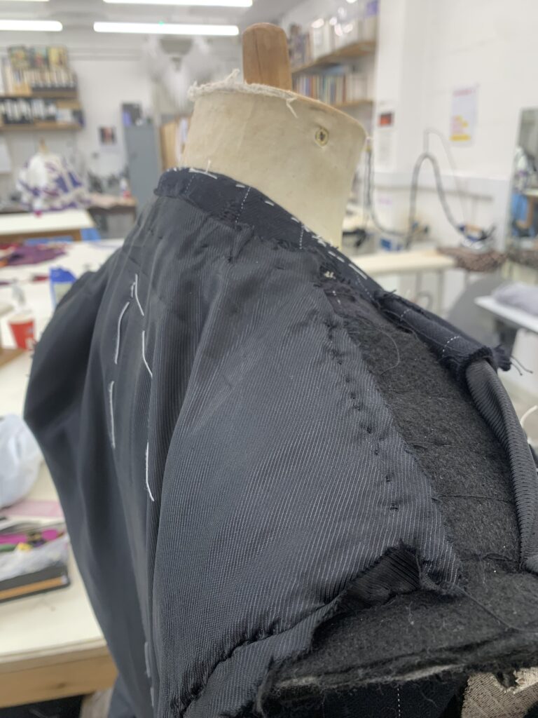 Stab stitching back lining to hold securly in place before felling down front linings