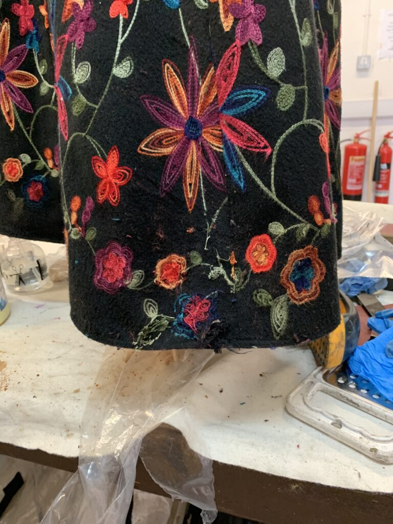 Focus on hem distressing, as most wear would happen here