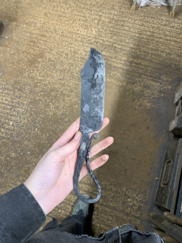 Finished blade (before grinding the edge down) with a stamped J